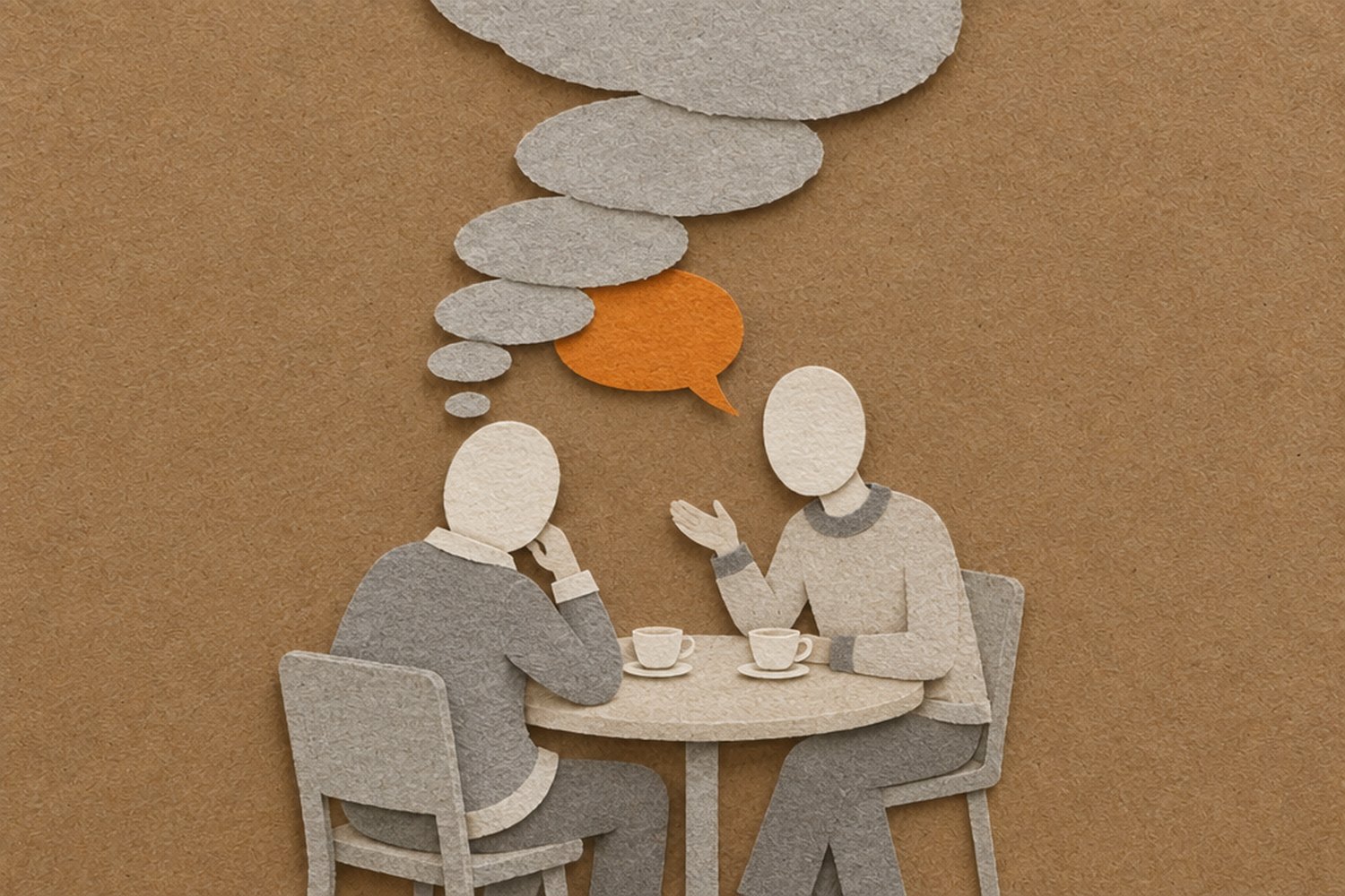A chain of grey paper thought fragments rises from a faceless figure's head, and the small speech bubble of the person across the table is hidden behind it